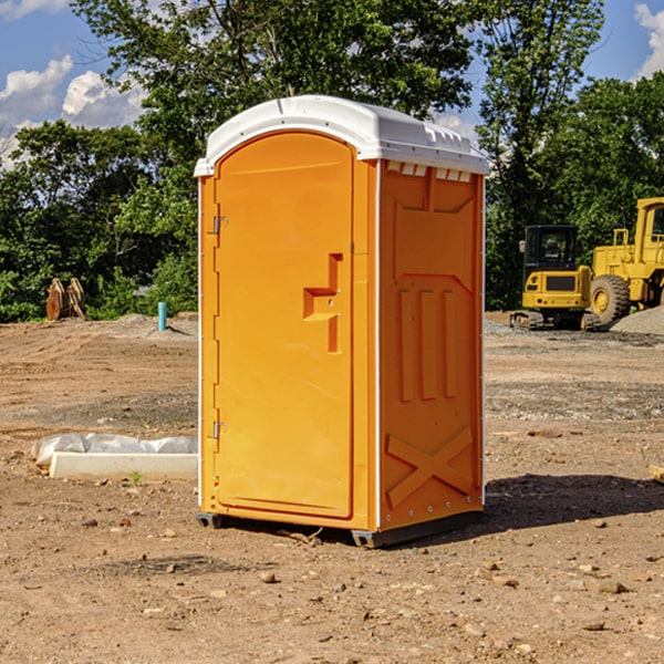 what is the cost difference between standard and deluxe portable toilet rentals in Shelby County Iowa